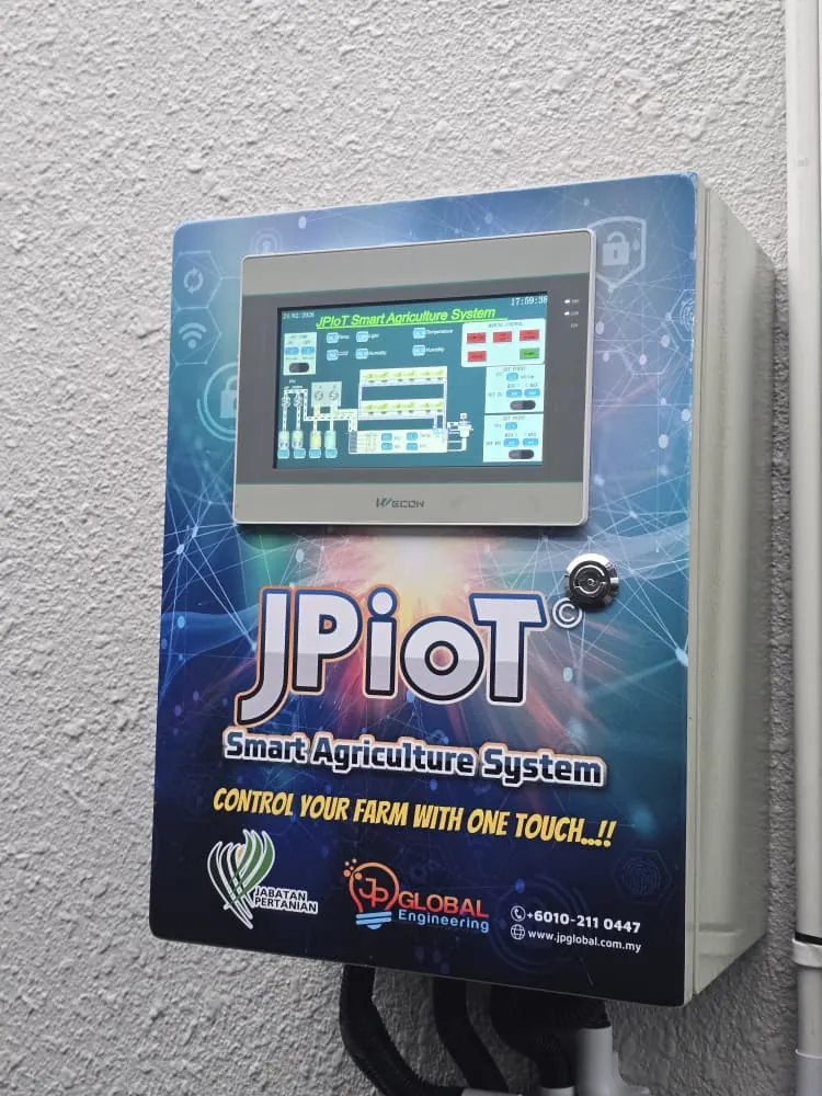 A JPIoT Smart Agriculture System controller mounted on a wall